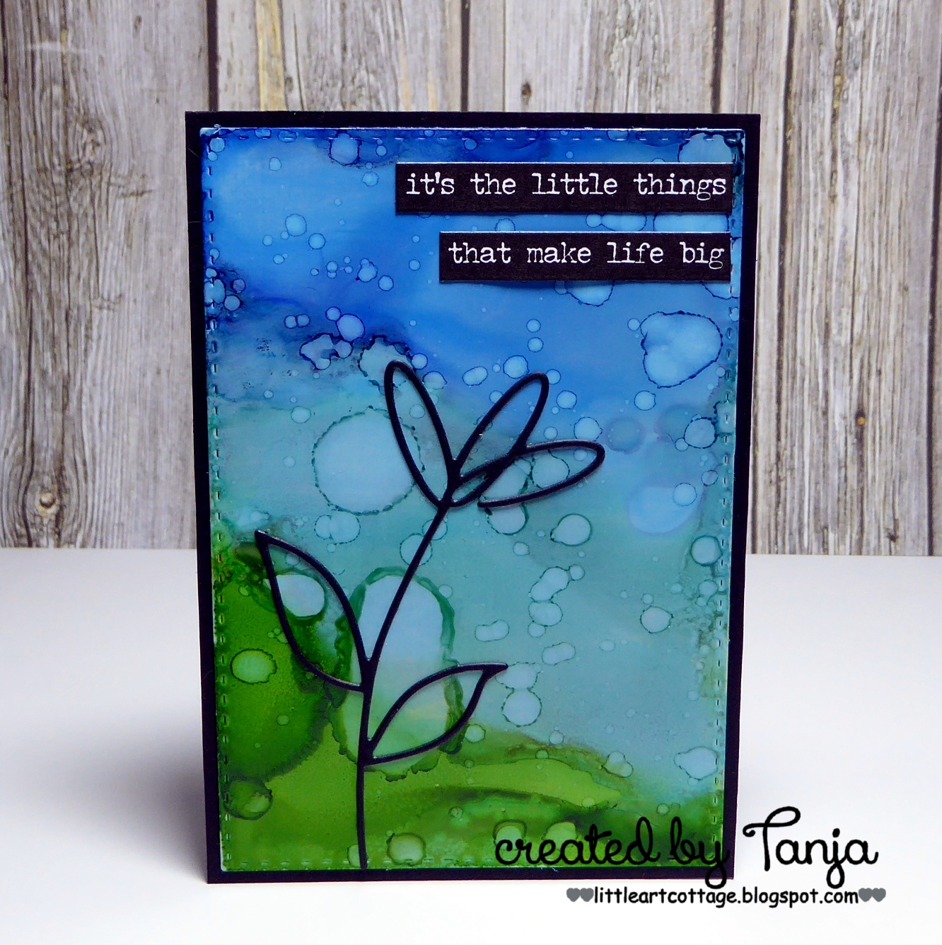 1 Die 8 Looks: Part 1 - Black Silhouette against Alcohol Ink Background