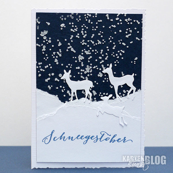 Rehe im Schneegestöber