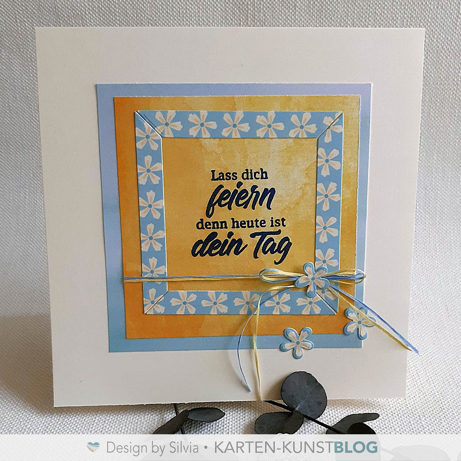 Zarte Geburtstagsgrüße mit Blumenrahmen