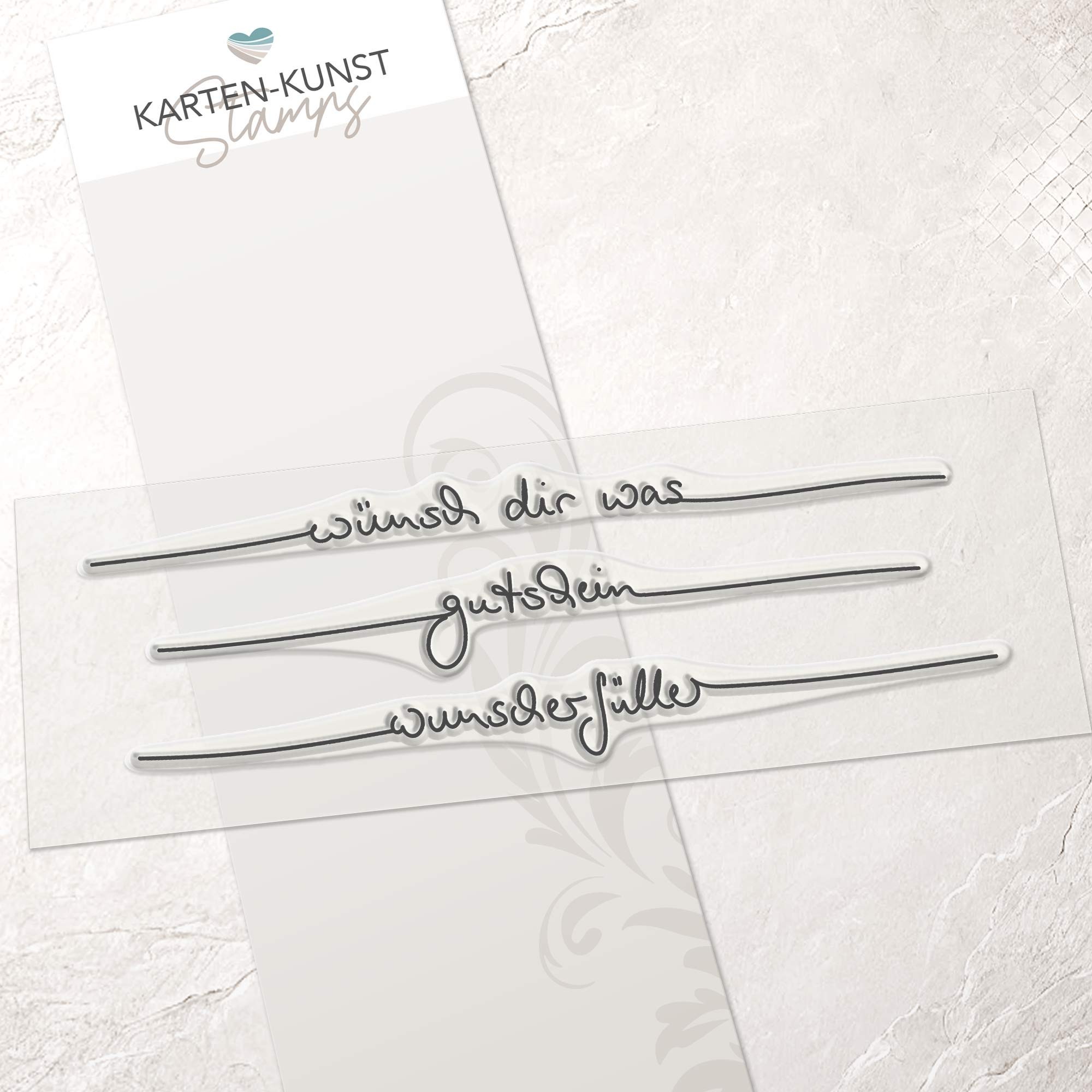 Clear Stamp Set mit den handschriftlichen Schriftzügen „wünsch dir was“, „gutschein“ und „wunscherfüller“ auf transparenter Trägerfolie, ca. 13 cm breit.